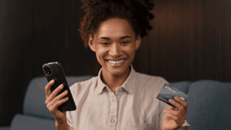 A person using a Postbank Flexi Debit Card