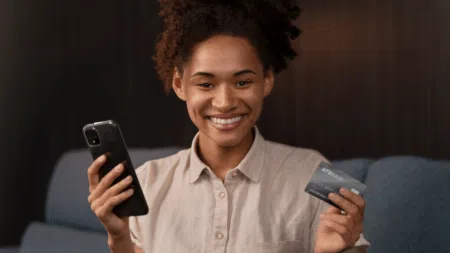 A person using a Postbank Flexi Debit Card