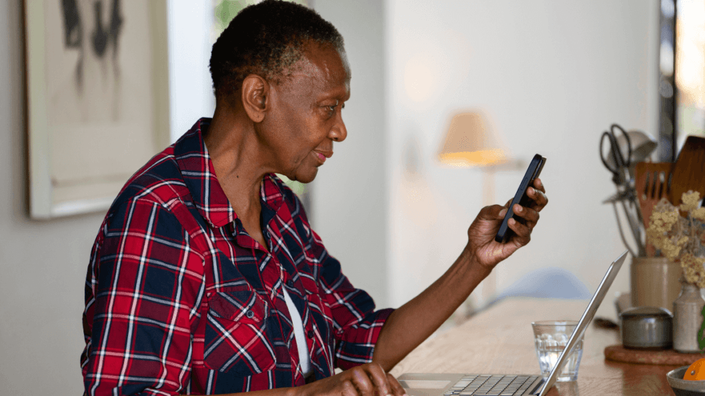 Person reporting SASSA fraud on the phone