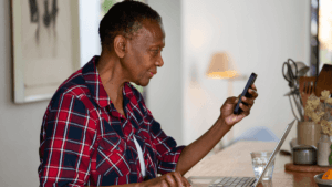 Person reporting SASSA fraud on the phone